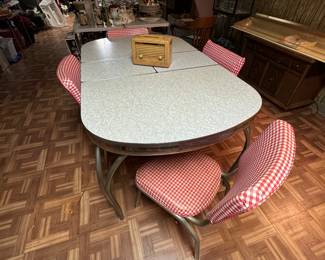 Chrome table with 4 chairs