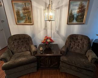 Matching green velvet suede swivel rockers