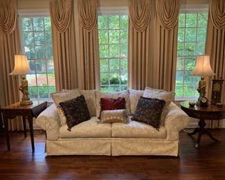 Sealy Floral Motif Upholstered Sofa (38"D x 94"W x 38" Back Height) & The Broyhill 100th Anniversary Collection Round Pedestal 1 Drawer Side Table (30"D x 26-1/2"H) & Maitland Smith 1 Drawer Mahogany Drop Leaf Side Table (26"D x 29"H x 40"W Open / 20"W Closed)