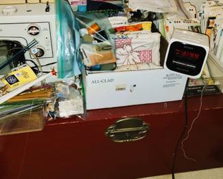 Blanket chest. 2 Kenmore sewing machines, 1960s/70s sewing patterns and sewing notions