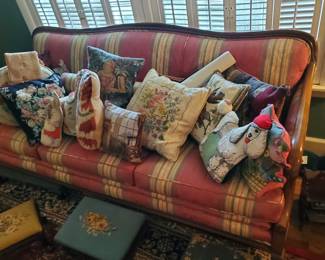 This sofa has wooden accents sits very confortably.