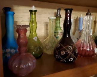 An Extensive Collection of Barber Bottles.