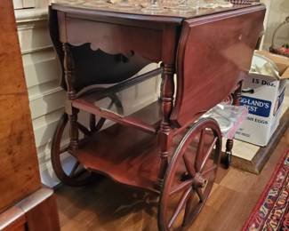 This tea chart is not just any tea cart! Great color and offers a glass/wood tray that can be used separately!