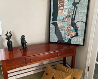 Console table by Thomasville, bronze decor, antique metal decor, pottery barn pillows (set of 4 available), and map of NY