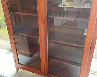 Thomasville bookcase with glass doors