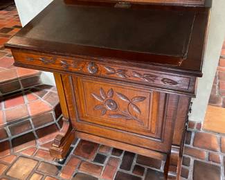 Antique Davenport desk with leather top, side drawers and upper storage compartment