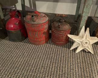 Vintage gas cans and cast iron stars