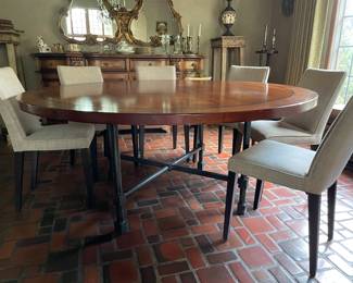 Another view of the 72" round table with metal base and 6 dining chairs