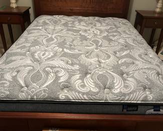 Antique full-sized bed with pristine mattress, made by Brothers Bedding in Knoxville
