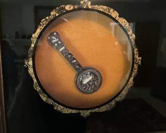 Miniature mandolin in shadow box