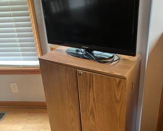 Samsung TV on cabinet