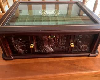 Carved front on state quarters chest