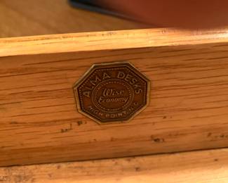 Alma Desks label inside middle drawer