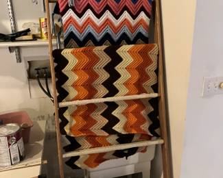 Afghans on wooden ladder