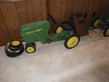 Vintage John Deer pedal tractor.