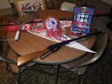Cardinal pennants, BB gun and toy slot machine.