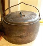 Antique covered cauldron