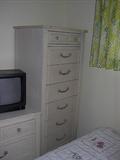 This bedroom set is by Craig. It has a small chest, a tall ches, desk and a matching corner desk that was hand made to match!