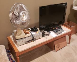 Travertine topped coffee table, fan, tv