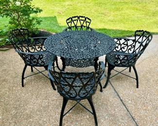 $550; 5-piece black, metal patio set with round table and 4 arm chairs; table: 40x27; chairs: 24x19x32