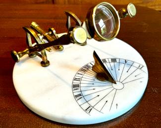 $150; Cannon sundial made of brass and marble; 7.5x5