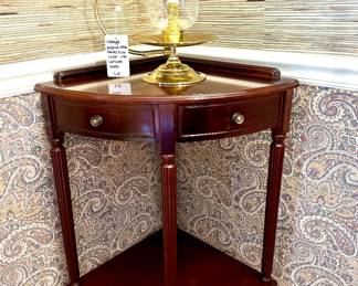 $68; corner table by Bombay with faux drawers; 23x16x31.    $48; vintage Baldwin brass candle stick holder with hurricane shade.