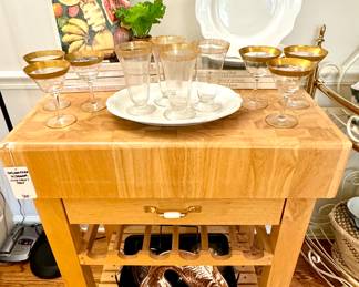 $300; butcher block table with drawer and wine rack and bottom shelf; 29x21x33.      