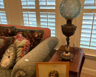 Custom sofa, picture, onyx and brass electrified oil lamp. 