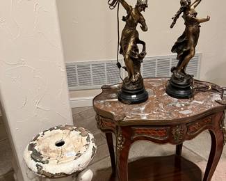 Pair of bronze lamps with lady holding up light with frosted glass petal shades signed Moreau 29 inches tall