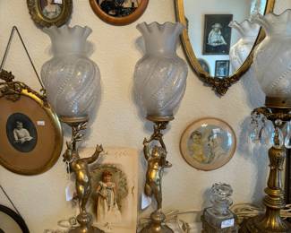 Lamps, mirror, and wall pictures.