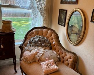 Lovely French settee, and wall hangings.