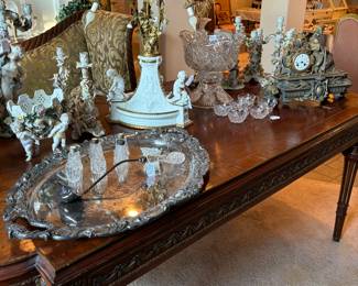 Cut glass punch bowl, cut glass and sterling silver ladle, Sitzendorf porcelain 4 taper candle holder, large standing angel with porcelain roses, large silverplate serving tray.
