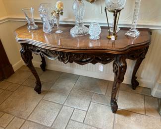 Walnut entry hall console table, lift top, concealed silverware compartment, highly carved. 