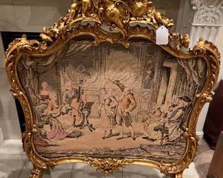 Louis XV gold gild fire screen, highly decorated, topped with angel and dove