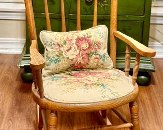 Antique oak child’s press back rocker