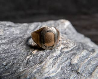 An antique 10K gold, approx. weight is 5.36 grams and is a size 6.5.