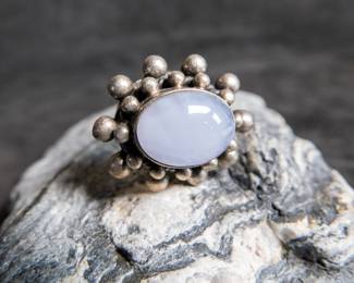 A vintage sterling silver ring, marked 925 with maker's mark. Approx. weight is 16.21 grams and is a size 6.75.