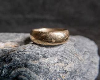 This lot features a solid 14K yellow gold band. Approx. weight is 14.28 grams and is a size 11.5.