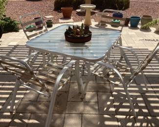 Patio table and four chairs, chairs will need cushions