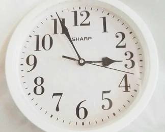621 - Sharp Battery Operated Wall Clock 10" round
