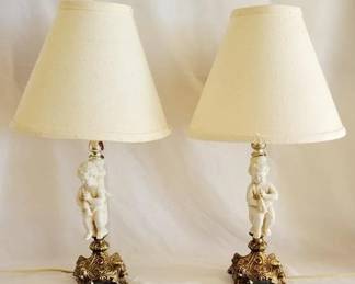 532 - Pair of Cherub and Cast Metal Lamps w/ Shades 18" tall You are buying a used as-is electric/electronic item. We do not guarantee all components are present, and if it is not expressly stated, it is untested.
