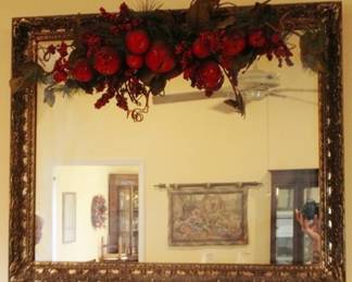 664 - Wall Mirror with garland at top - 34 x 28
