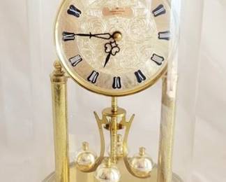 527 - Hamilton Quartz Dome Clock 12" Tall You are buying a used as-is electric/electronic item. We do not guarantee all components are present, and if it is not expressly stated, it is untested.
