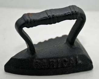  PAPERWEIGHT C I IRON  ADVERTISING RARICAL TABLETS ON BASE ON ON CAST IRON