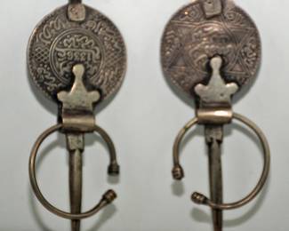 Amazigh fibula (Taẓṛẓit) is a traditional fibula or brooch with practical and symbolic importance in Amazigh cultural heritage. As a common item of the jeweler of the Berber cultures