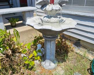 Concrete bird themed water fountain.