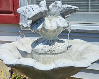 Awesome water fountain! Makes a lovely setting near your front door.