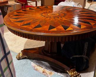 Antique Large Mixed Wood Table with Gilded Feet 
60 x 31 h 