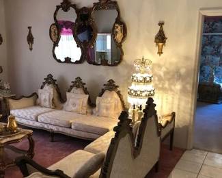 Mirrors on walls and living room couches