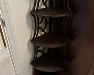 Two of these etagere corner shelves.